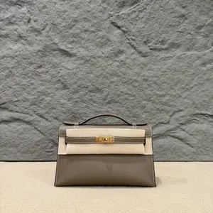 Pre-owned HERMÈS Leather tote bags Hermes Kelly Pochette Swift 18 Etoupe (cr1221a0)