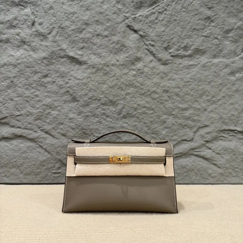 Pre-owned HERMÈS Leather tote bags Hermes Kelly Pochette Swift 18 Etoupe (cr1221a0)