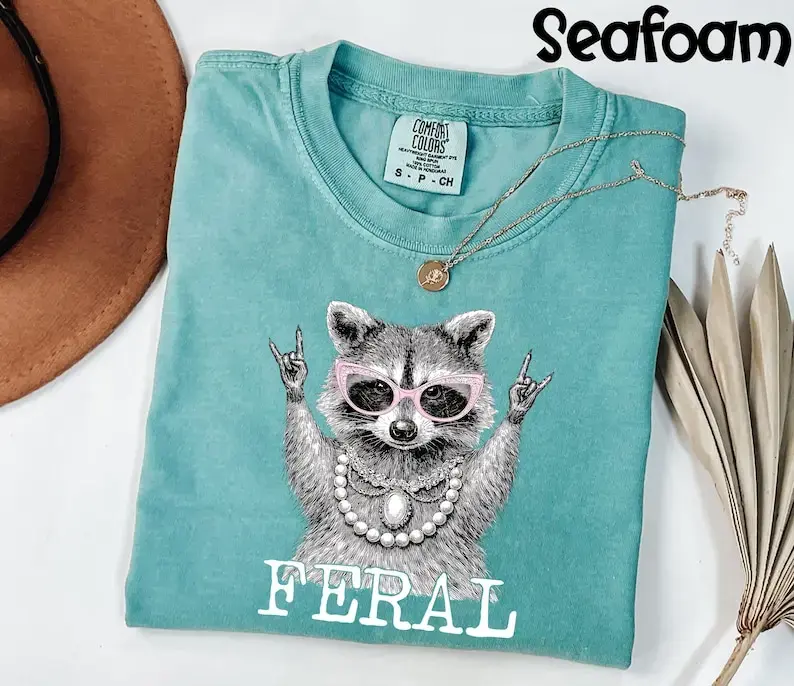 [Sale Up To 50%] Comfort Colors Feral Shirt, Funny Raccoon Graphic Tee, Sassy Animal Lover Gift for Women - Rock Rolla