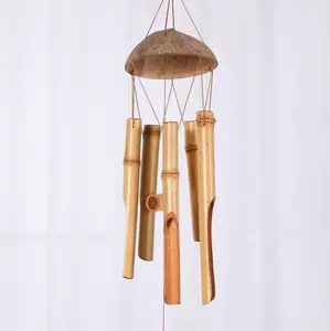 Handcrafted Bamboo Wind Chime — Featuring five bamboo tubes and a half-coconut shell top. It produces a deep, resonant tone and serves as a charming wooden wind chime suitable for both indoor and outdoor home decoration.