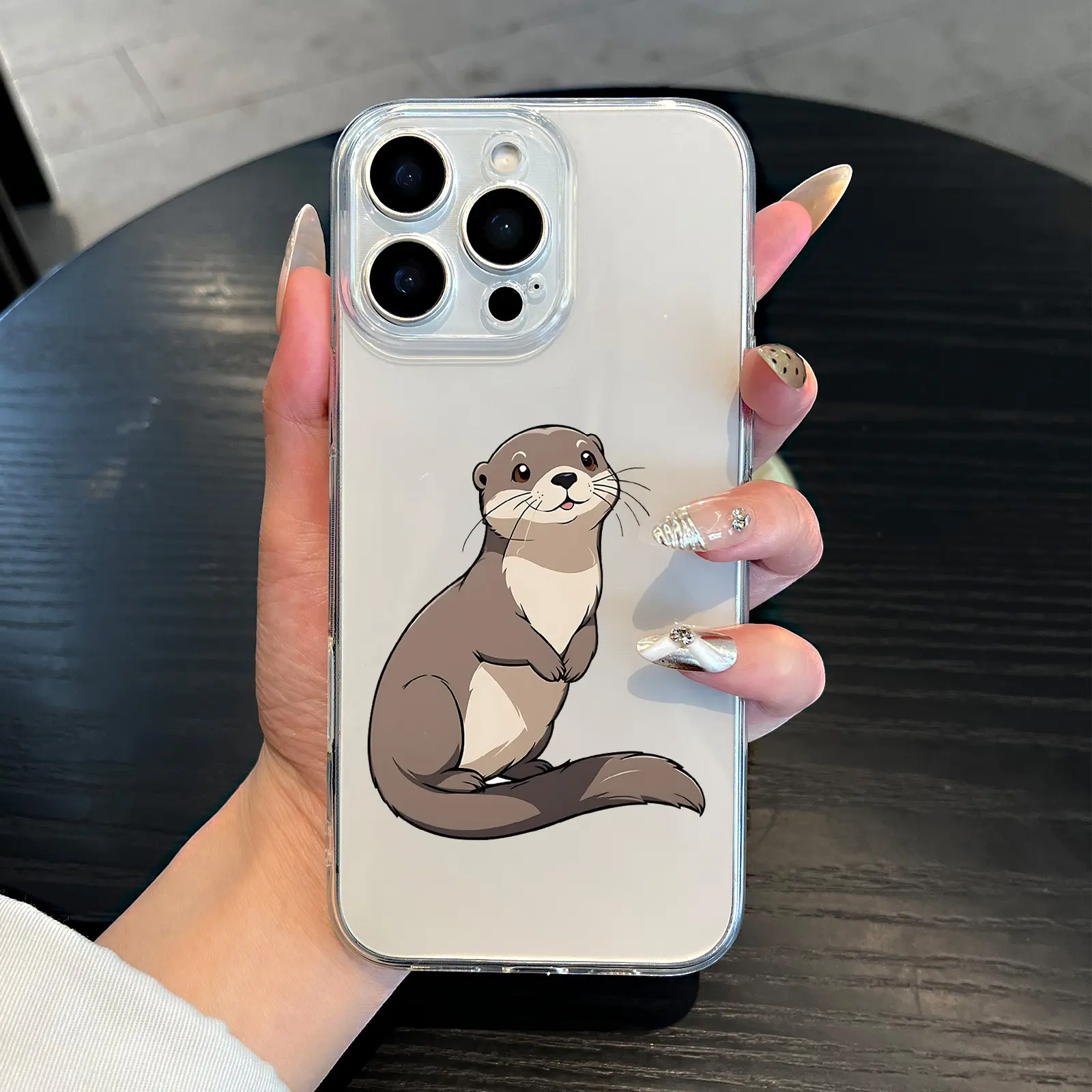 A cute little otter pattern phone case, TPU shockproof full protection case,  suitable for iPhone 17/
