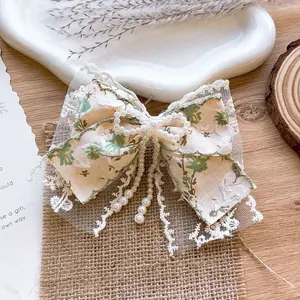 Embroidered Floral Bow Hair Claw with Soft Mesh Finish