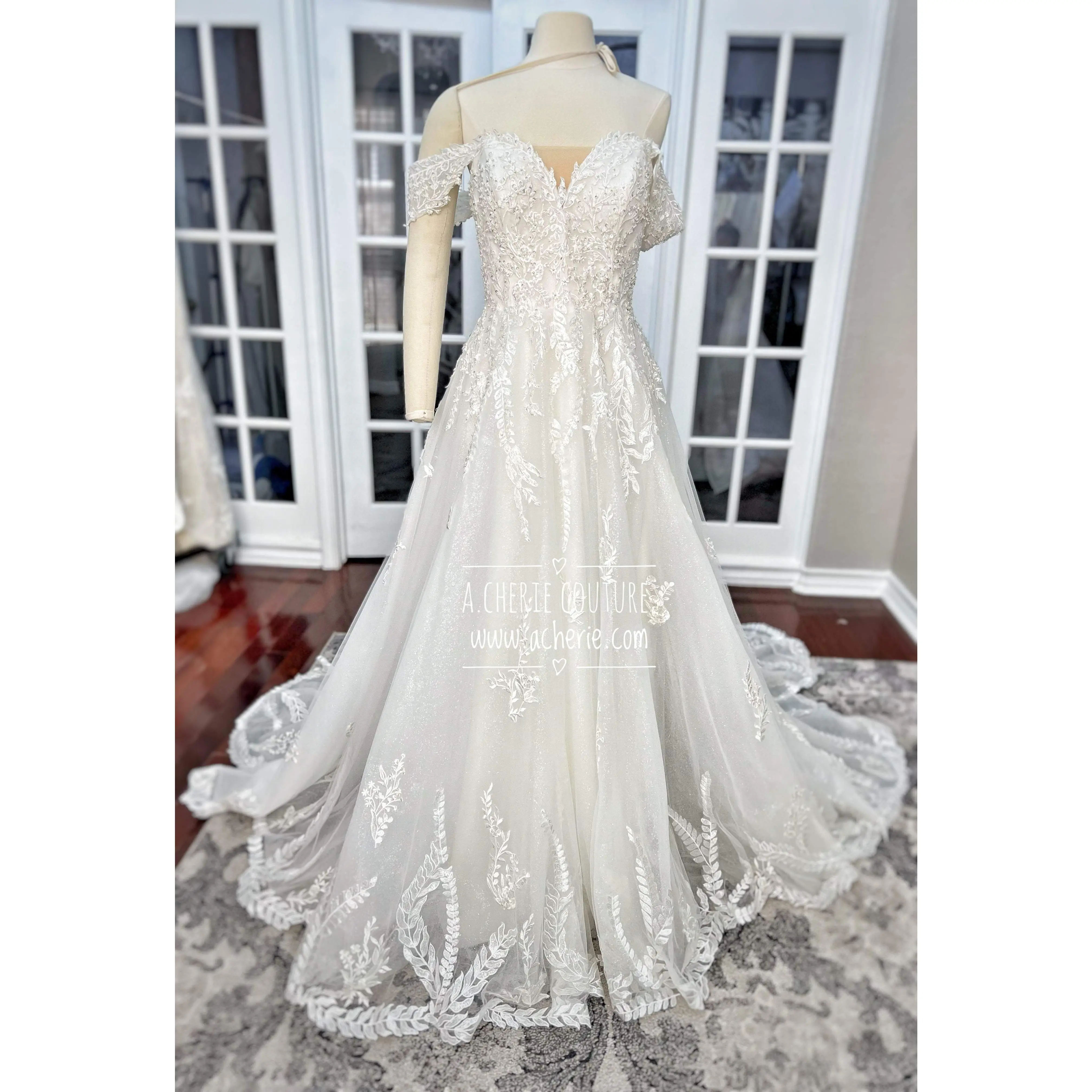 A-Line Off-Shoulder Wedding Dress with Glitter Tulle, Lace Beading, a Sheer Low Back & Scalloped Cathedral Train