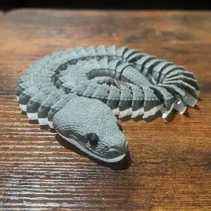 Articulated Xenodermus Snake Unique Reptile Species with Distinct Articulated Limbs Ideal for Enthusiasts and Educational Purposes