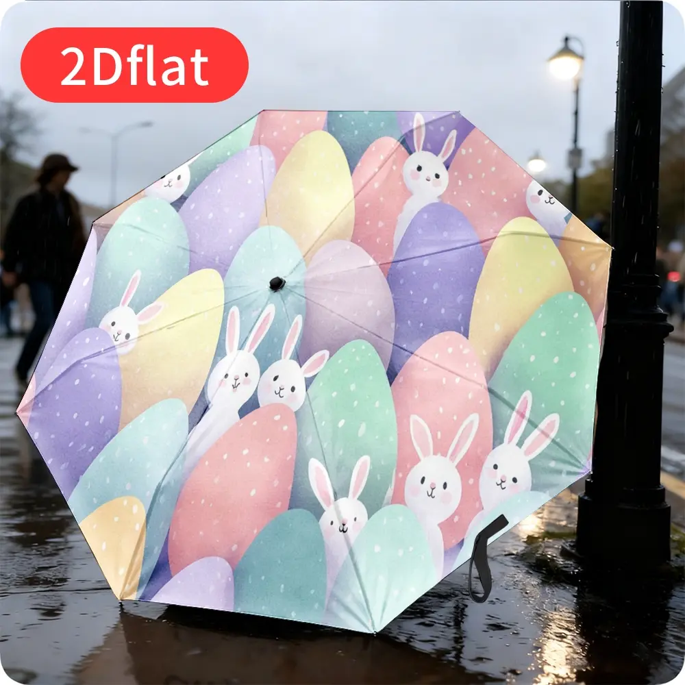 An Easter folding umbrella featuring cute bunnies and colorful Easter eggs in a 2D flat print design, with a durable canopy made of sturdy plastic and metal—ideal for travel, commuting, and everyday casual use.