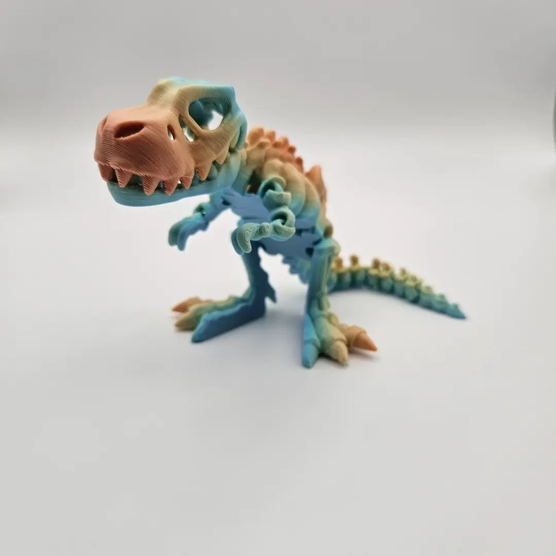 3D Printed Articulating Rainbow Flexi Skeleton T-Rex Figurine Great Gift and Desk Figure