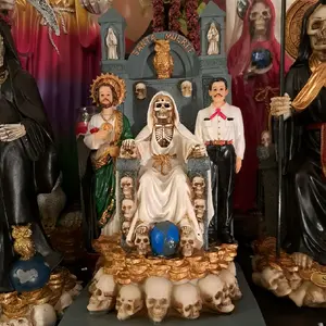 Santa Muerte Statue with Gold Accents and Skull Base for Religious Decor