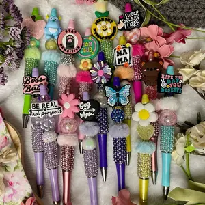 “RHINESTONE/DESIGN LIVE CLAIM” beaded pen