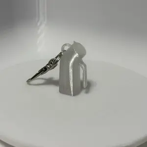 Urinal badge keychain