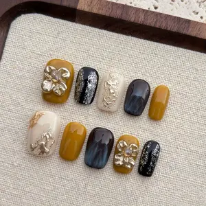 Handcrafted Oval False Nails Set of 10 in Japanese Retro Style Yellow Black Off-White with 3D Flower Shapes Elegant Avant-Garde Fashion Reusable for Women