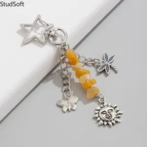 2026 New Arrival: Star, Crescent Moon, and Turquoise Tassel Keychain — "Sweet & Cool" Style Hollow Butterfly Alloy Bag Charm