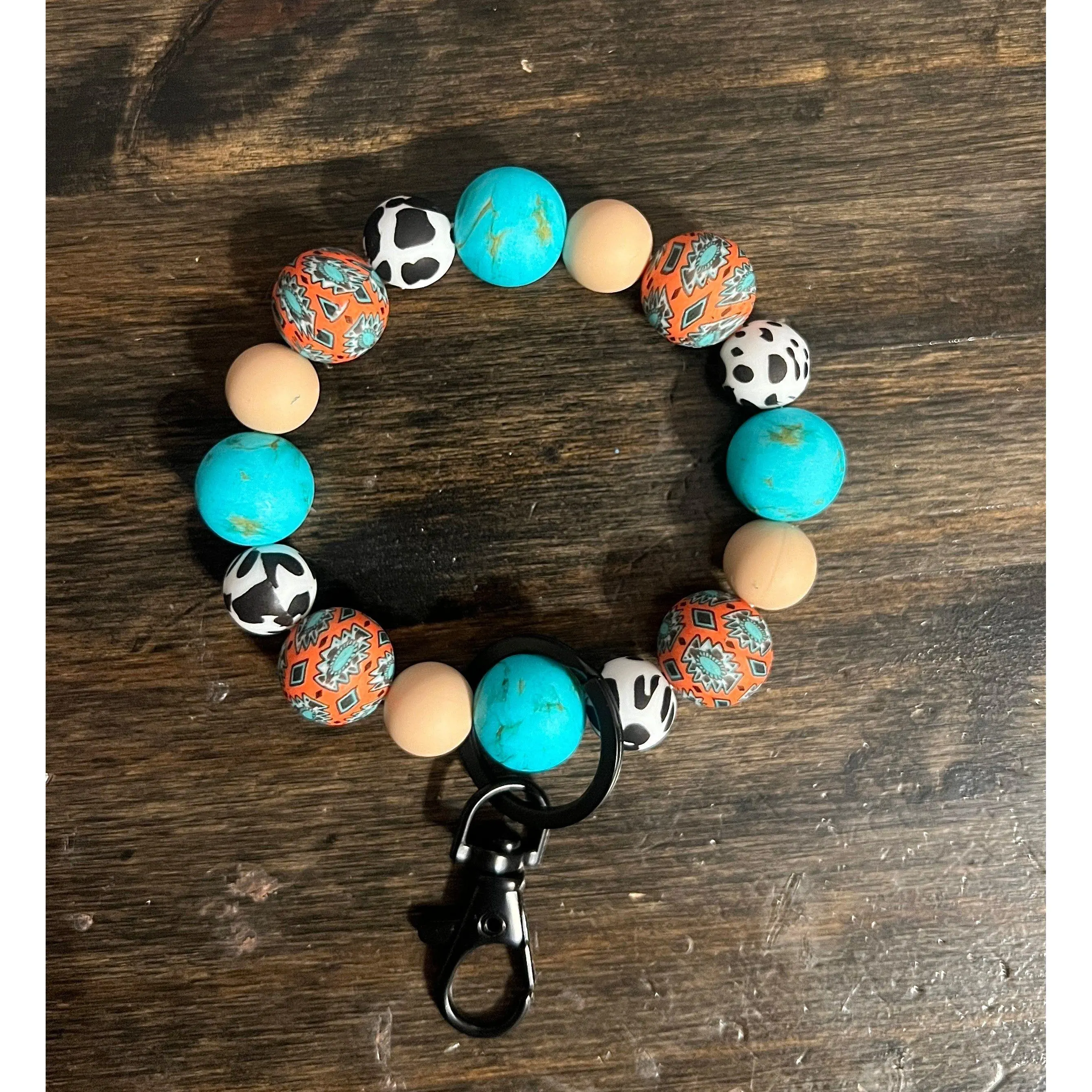 Rust Aztec Turquoise Stone Cow Print Wristlet