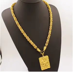 A set. Vietnamese sand gold plated pendant necklace with a dragon-shaped pendant. Suitable for men to wear. Perfect for special occasions as a beautiful accessory gift for fathers, husbands, and couples. Gold Statement Chain