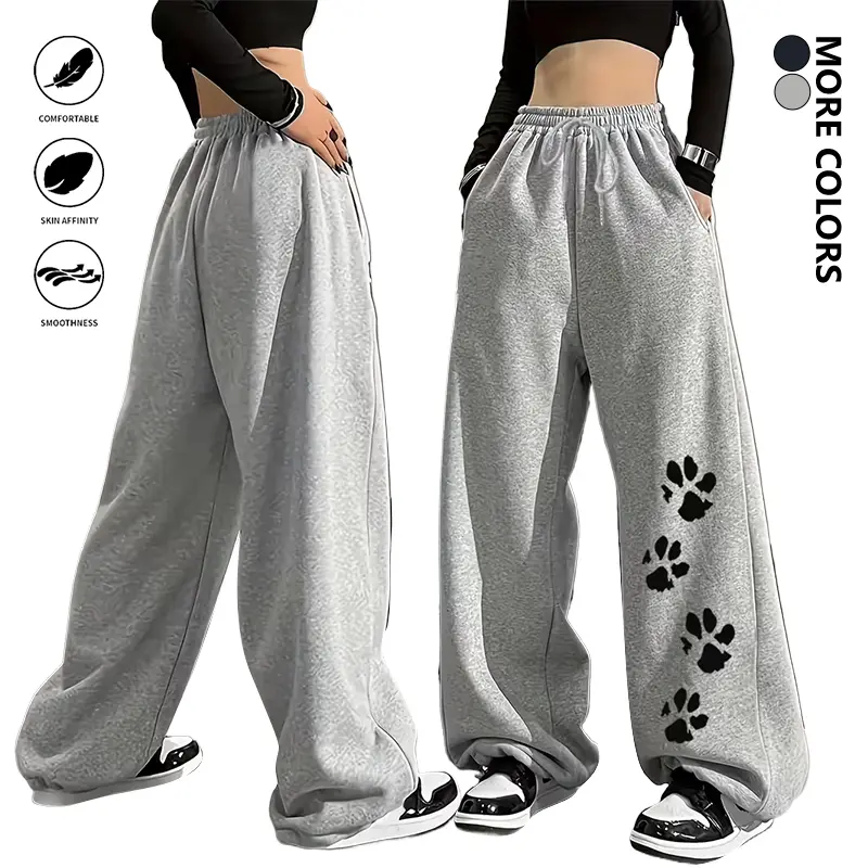 Life keeps moving — women’s fashion athletic long pants with embroidered star pattern, elastic waistband and drawstring, suitable for spring/autumn outdoor leisure and everyday wear.