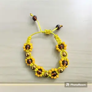 Sunflower Sizzle: Handcrafted Beaded Braided Bracelet.