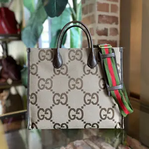 Pre-owned GUCCI GG canvas Crossbody Bags GUCCI Beige Monogram Jumbo GG Textured Dollar Calfskin Web Tote