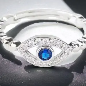 Adjustable evil eye ring