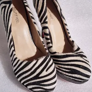 Zebra print  fashion heels size 8.5