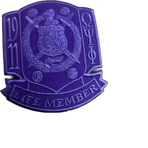 Purple Omega Psi Phi Life member iron on patch.