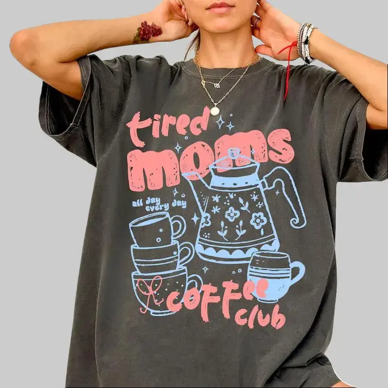 Tired Moms Coffee Club Comfort Colors T-Shirt, a funny retro coffee lover graphic tee, perfect for mom life, featuring a vintage preppy espresso style.