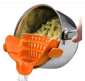 Kitchen Gizmo Snap N Strain Clip On Strainer for Pots and Pans - Adjustable Silicone Colander for Kitchen - Compact Clip-On Food Strainer for Draining Pasta and Vegetables - Orange