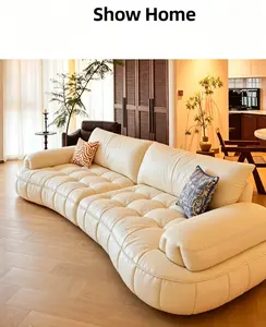 Cream Curved Modular Top Grain Leather Sofa, Cloud Puffy Channel Tuft Couch with Goose Feather Back Cushion, 2 Depth Options Oversized Deep Seat Cream Leather Sofa for Warm Cream Style Living Room