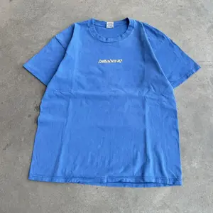 Vintage late 90s early 2000s BILLABONG faded blue front and back graphic surfing t shirt