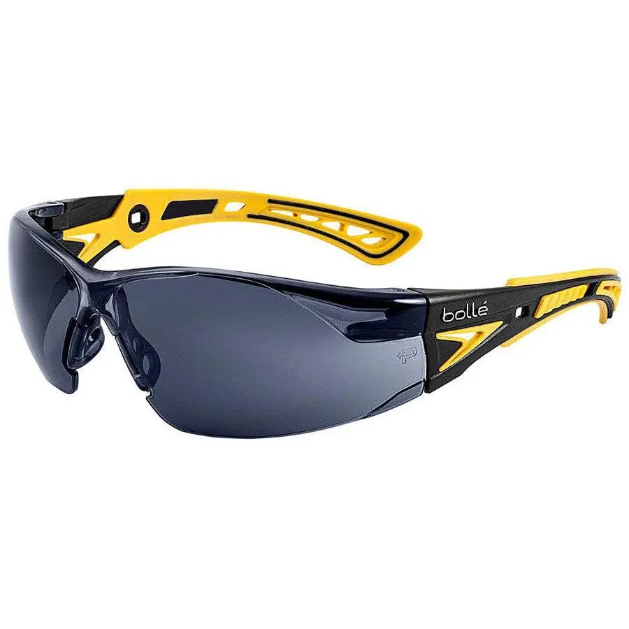 Bolle Rush Plus Small ANSI Compliant Safety Goggles Z87, Black-Yellow Frame, Ultra-Slim Smoke Platinum Anti-Fog Coat Lens, 99.9% UVA UVB Block Protection, Home Improvement Work Safety Equipment