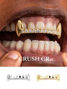 CRUSH CR Y2K Vampire Fang Iced Out Grillz for Women, 18K Gold Plated Edgy Fang Design with Shiny CZ Accents, Hypoallergenic and Removable, Perfect for Festival Fits, Rave Outfits, Streetwear Looks and TikTok OOTDs, Timeless 2000s Vibes Dental Jewelry