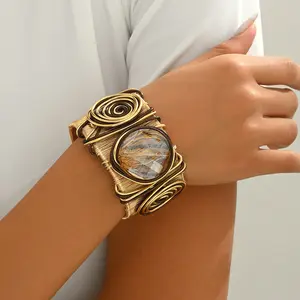 Niche luxury European and American style women's bracelet with unique spiral design and gemstone inlay, versatile wrist accessory, perfect graduation gift for women