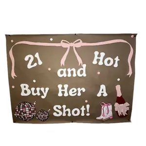 “21 and hot buy her a shot” brown paper banner.