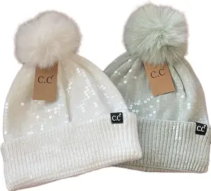 C.C All Over Clear Sequin Pom Beanie - 48% Viscose, 27% Nylon, 25% Polyester, 100% Faux Fur, 8.75" x 8.5"