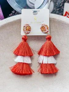 Football orange/white tassel earrings