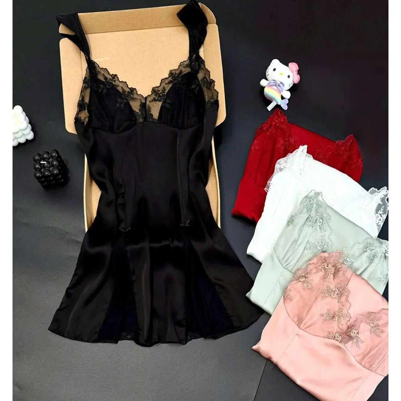Elegant Black Lace Trimmed Satin Camisole with Adjustable Straps and Flared Hem for Women