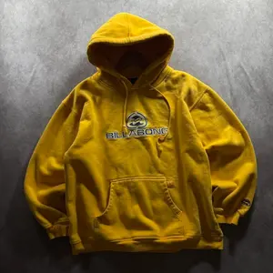Retro Yellow Y2K Billabong Surf Hoodie from the 2000s - Vintage Style Statement Piece
