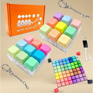 2 pack 9 in 1 mini keyboard fidget toy is a stress relief clicker keychain with 70 colorful removable keycaps featuring clicky button fidget for adults perfect for calm anxiety at office travel school and home