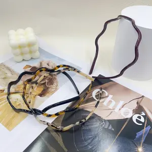 A set of 4 different colored wavy glasses headbands, goggles headbands, and pressure-free anti-slip headbands for women