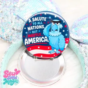 Sam Eagle “A Salute to All Nations, But Mostly America” Celebration Button – Patriotic Park Celebration Pin – America 250th Anniversary