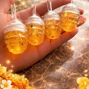 Pumpkin Perfect Lip Oil - Golden Glittery Texture for a Luxurious Feel