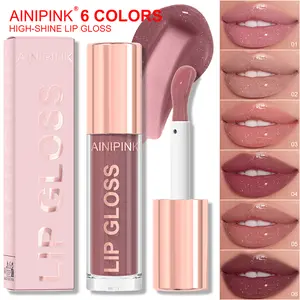 AINIPINK Fine glittered pearlescent lip gloss, with a luminous glass-like lip makeup effect, transparent bottle body, long-lasting moisturizing and hydrating properties, suitable for both layering and single application.