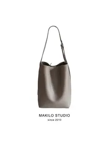 Women's solid color casual and simple bucket bag - relaxed style, sophisticated and fashionable tote bag with large capacity. It can hold a 15-inch Apple laptop and is suitable for daily use and commuting.