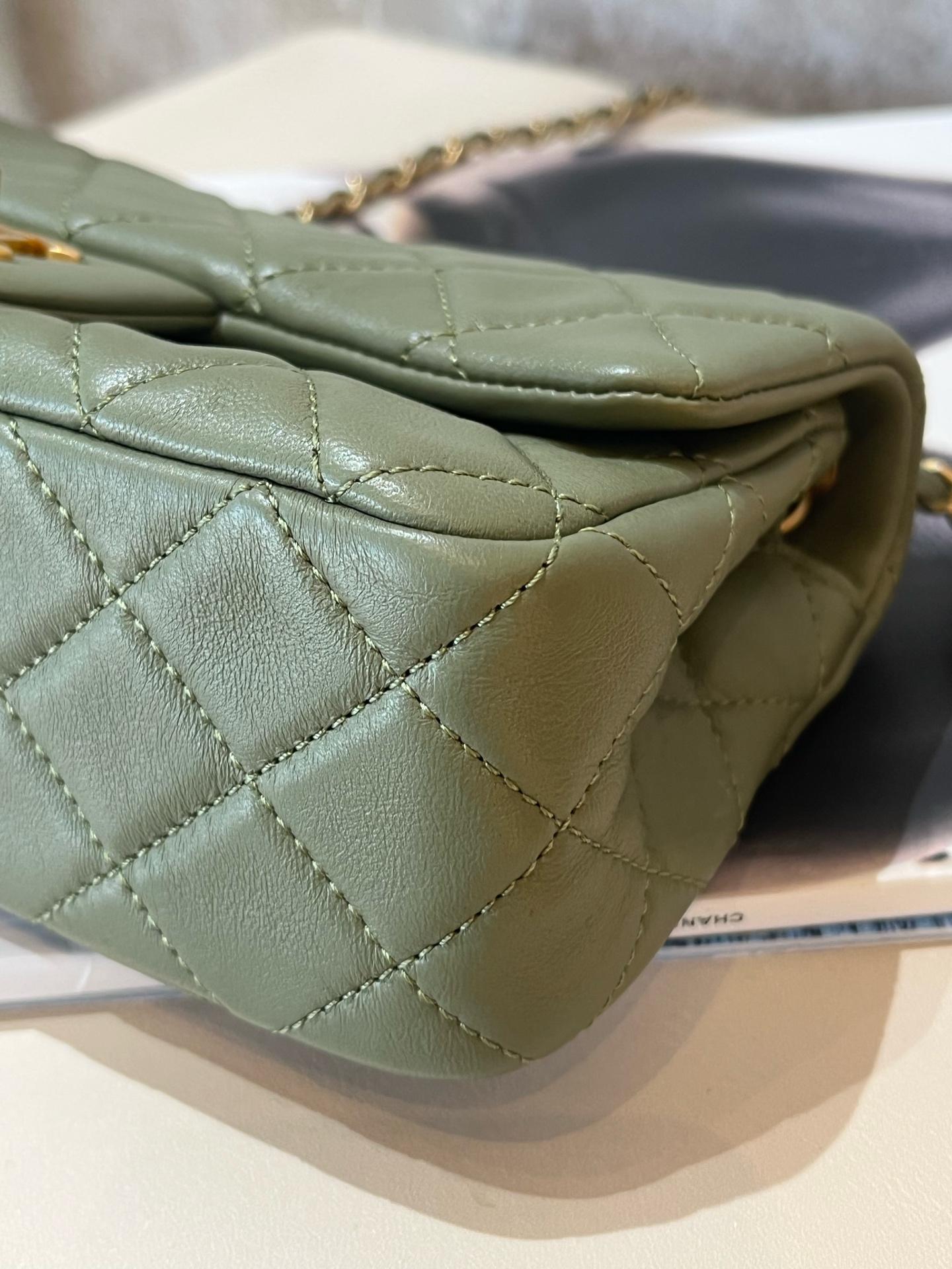 Pre-owned CHANEL Mini Rectangular Classic Flap Bag in avocado green lambskin, featuring the iconic adjustable gold ball chain 1919H0106
