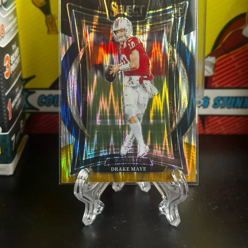 2024 Panini Select Football #27 Drake Maye Black Gold Shock Concourse Prizm RC