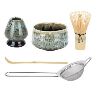 Japanese matcha tool set, including a ceramic matcha bowl, a bamboo matcha whisk, and accessories suitable for matcha coffee and afternoon tea.