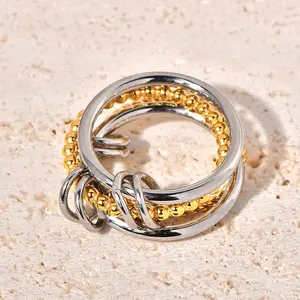 Four-layer twist ring - two-color stitching plus round wire - titanium steel electroplated