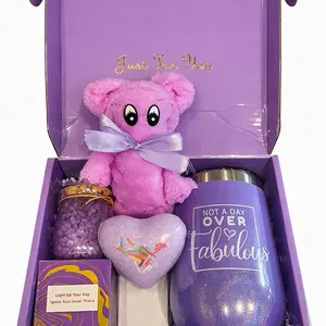 Ready-to-gift purple gift box set for her with a glitter tumbler, cute teddy bear towel, candle, bath salts and a heart-shaped bath bomb. Perfect for birthdays, thank-you gifts, self-care nights and any special occasion.
