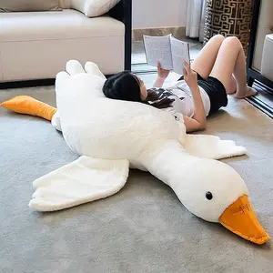 Cute Big White Goose Plush Pillow Toy! Large and irresistibly huggable, it's a favorite for both kids and adults. Suitable for all beds, offering coziness whether you cuddle or clamp it. A practical and sweet sleep companion. Soft Stuffed Soft Pinch