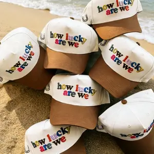 2026-how lucky are we trucker hat - brown