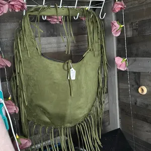 Oversized green suede fringe hobo bagd