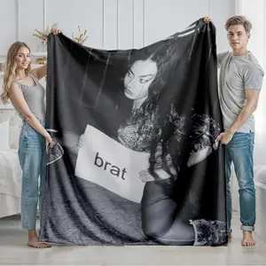 1 piece A photo of a girl in black and white street style holding a "brat" sign. themed flannel blanket - Microfiber soft fluffy sofa blanket, suitable for beds and sofas, modern style, all-season use, digital print design, flannel weaving craft